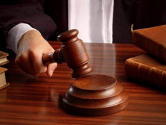 На Київщині за ґрати на 7 років відправили заробітчанина, який сокирою зарубав свого знайомого 