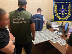 Бориспільському слідчому "світить" 10 років за хабар в 7000 доларів (ФОТО)